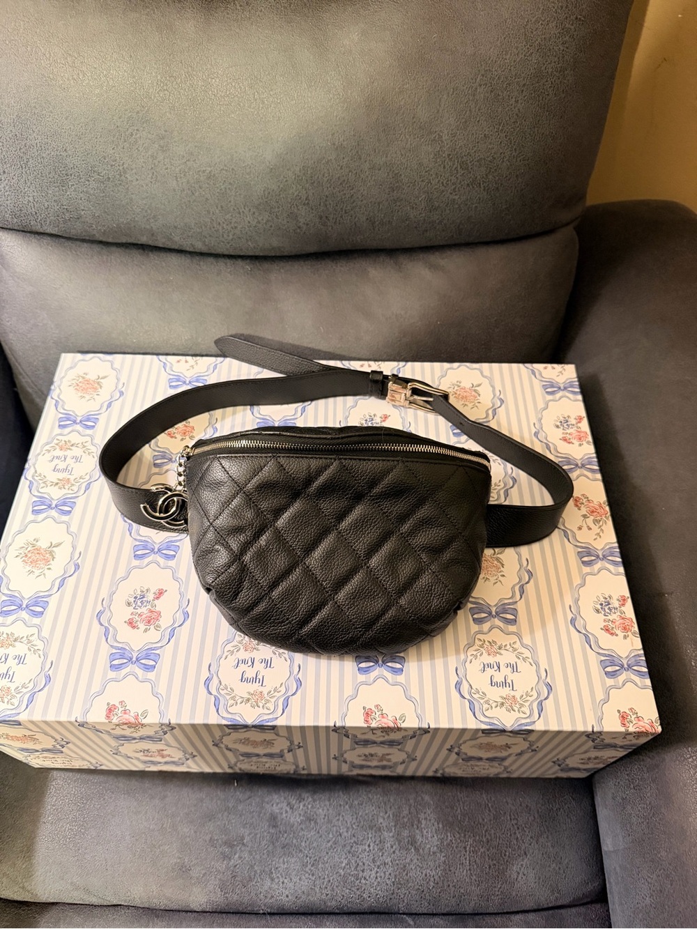 CHANEL Belt Bag Black Quilted Leather Silver-tone CC hardware.